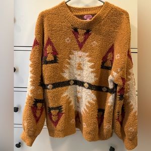 Miami for Francesca’s fuzzy sweater, tribal design size large